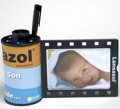 film reel canister pen pot and photo frames | Adband